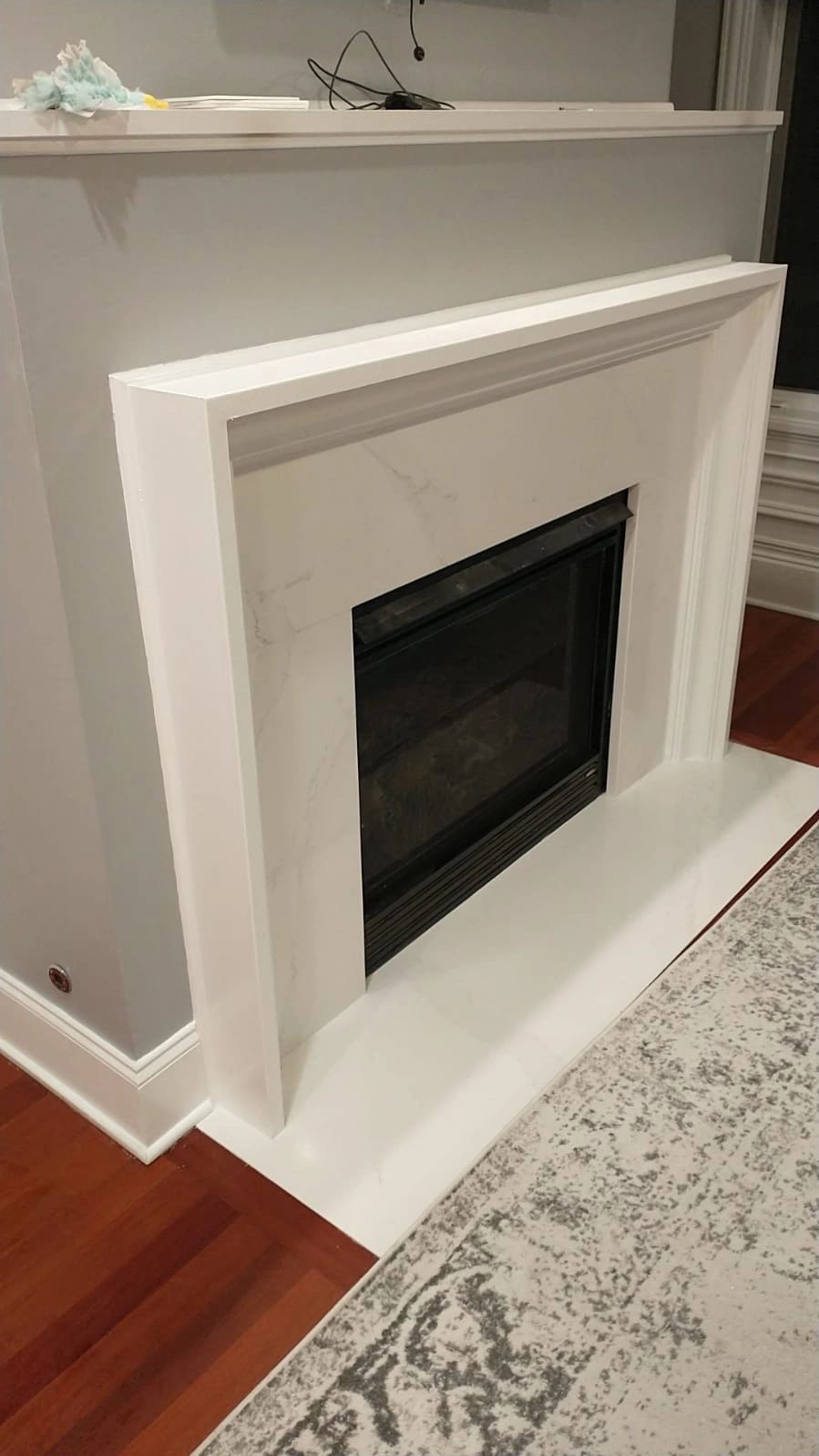 Fireplace renovation with marble surround